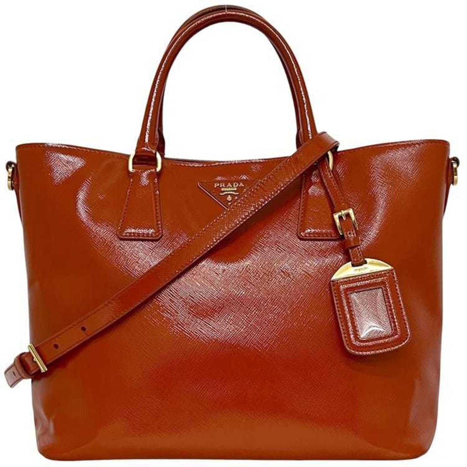 Patent Leather Tote Bag Handbag: Patent Leather Tote Bag Handbag Patent leather tote bag with a vibrant orange color, measuring 23.5cm x 34cm x 15cm. This stylish handbag features patent leather material and bears a signature. The