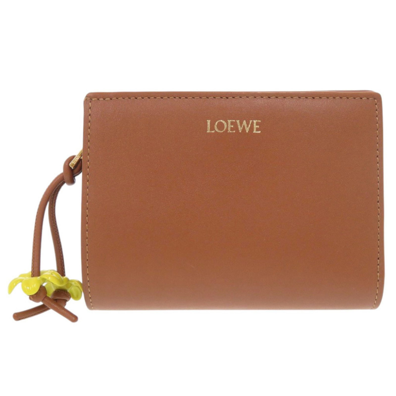 Loewe Wallet (Bi-Fold) Leather: Loewe Wallet (Bi-Fold) Leather Brown Loewe bi-fold leather wallet with 8.5cm x 11.5cm x 3cm dimensions. This wallet features high-quality leather construction and a classic design. Made in Spain, it