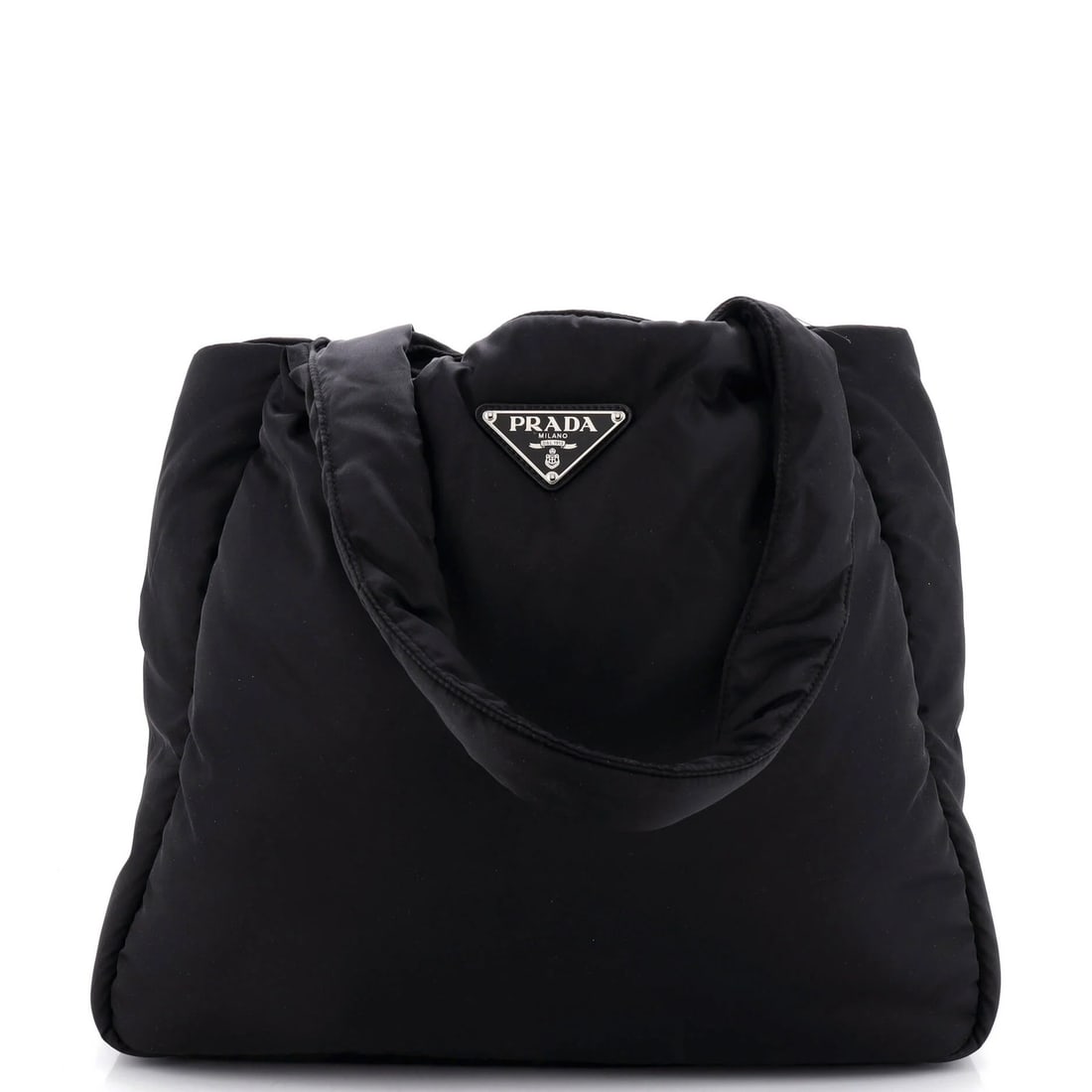Padded Soft Tote Re Nylon Large Prada: Padded Soft Tote Re Nylon Large Prada Large Prada Padded Soft Tote in Black Nylon, featuring a classic design with minor scuffs and creases. The exterior measures 15" wide, 13.5" tall, and 4" deep,
