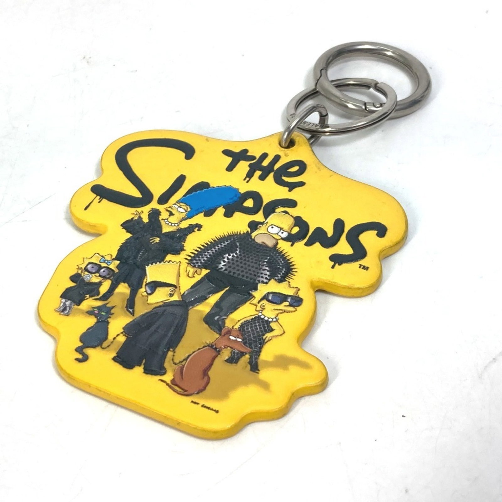Keyring Leather By Balenciaga: Keyring Leather By Balenciaga Yellow leather keyring from Balenciaga. Made from high-quality leather, this keyring is a stylish accessory for everyday use. The Balenciaga brand is known for its sleek