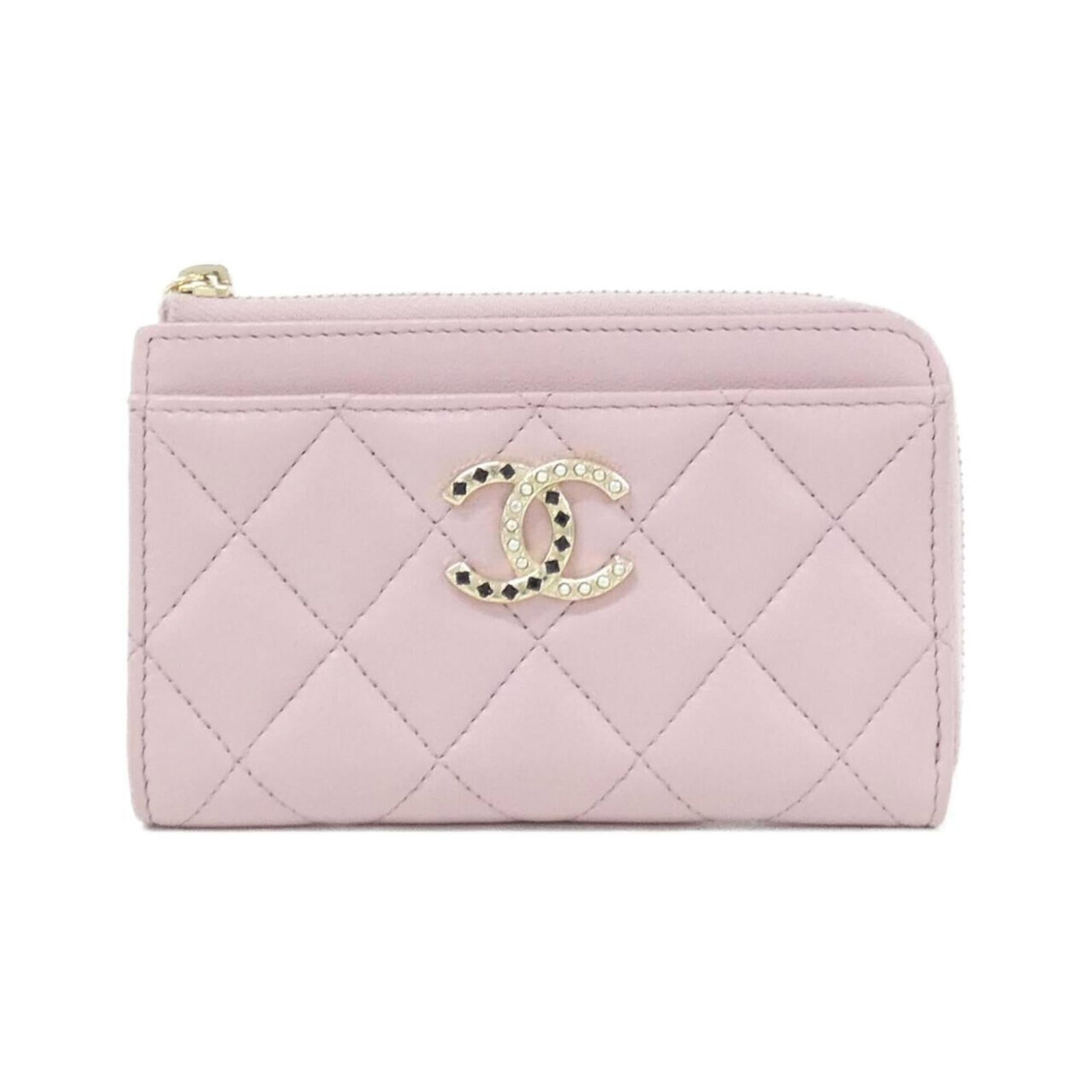 Chanel Card Case Leather: Chanel Card Case Leather Pink lambskin Chanel card case with a classic design, featuring a small size that fits perfectly in a purse or pocket. Made from high-quality leather, this card case is a time