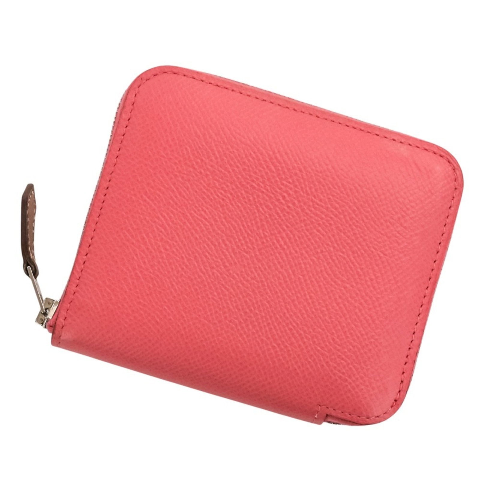 Hermes Coin Purse/ Coin Case Epsom Leather: Hermes Coin Purse/ Coin Case Epsom Leather This Epsom leather coin purse from Hermes features a soft pink hue and a compact size, making it a stylish accessory for everyday use. The coin case is