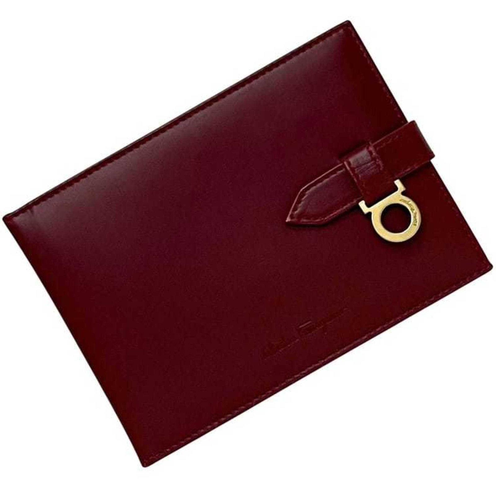 Salvatore Ferragamo Leather Card Case: Salvatore Ferragamo Leather Card Case Red leather card case from Salvatore Ferragamo, measuring 10cm x 14cm x 1.3cm, offering a compact and stylish way to carry essentials. Made from high-quality