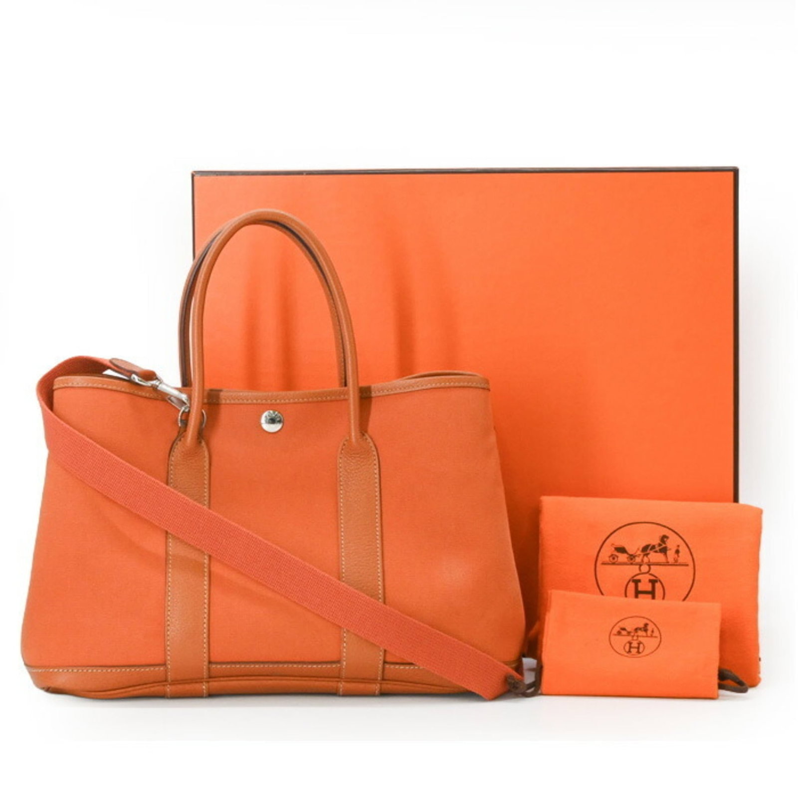 Hermes Handbag Tote Bag Negonda Leather: Hermes Handbag Tote Bag Negonda Leather Negonda leather tote bag from Hermes, crafted in France, features a classic design with a brown and orange color combination. The bag measures 21cm x 30cm x