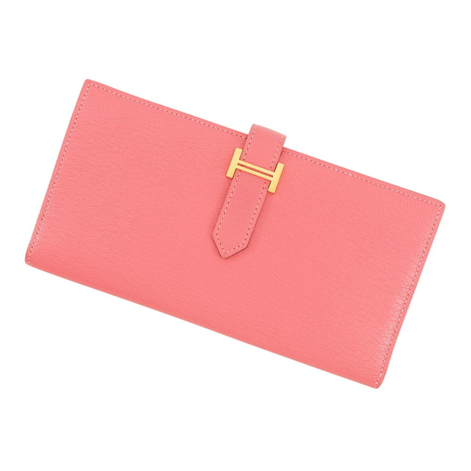 Chevre Myzore Leather Bi fold Wallet Hermes: Chevre Myzore Leather Bi fold Wallet Hermes Chevre Myzore Leather Bi Fold Wallet by Hermes is a stylish and elegant accessory, crafted from high-quality Chevre myzore leather in a soft pink hue.