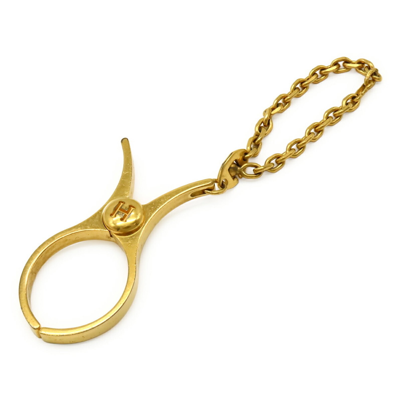 Hermes Glove Holder Gold Plating: Hermes Glove Holder Gold Plating Gold plating adds a touch of luxury to this elegant glove holder, a stylish accessory from Hermes. Made from gold plating, this glove holder shines with a