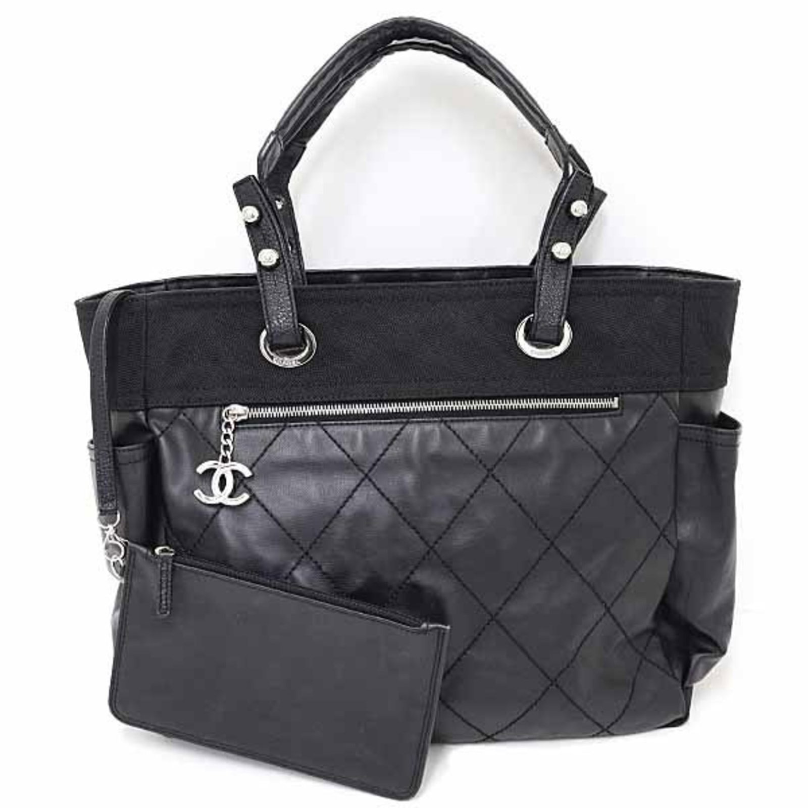 Coated Canvas Leather Shoulder Bag Tote Bag Chanel: Coated Canvas Leather Shoulder Bag Tote Bag Chanel Coated canvas and leather make up this stylish shoulder bag, measuring 30cm x 34cm x 14.5cm. The bag features silver hardware and a pouch for added c