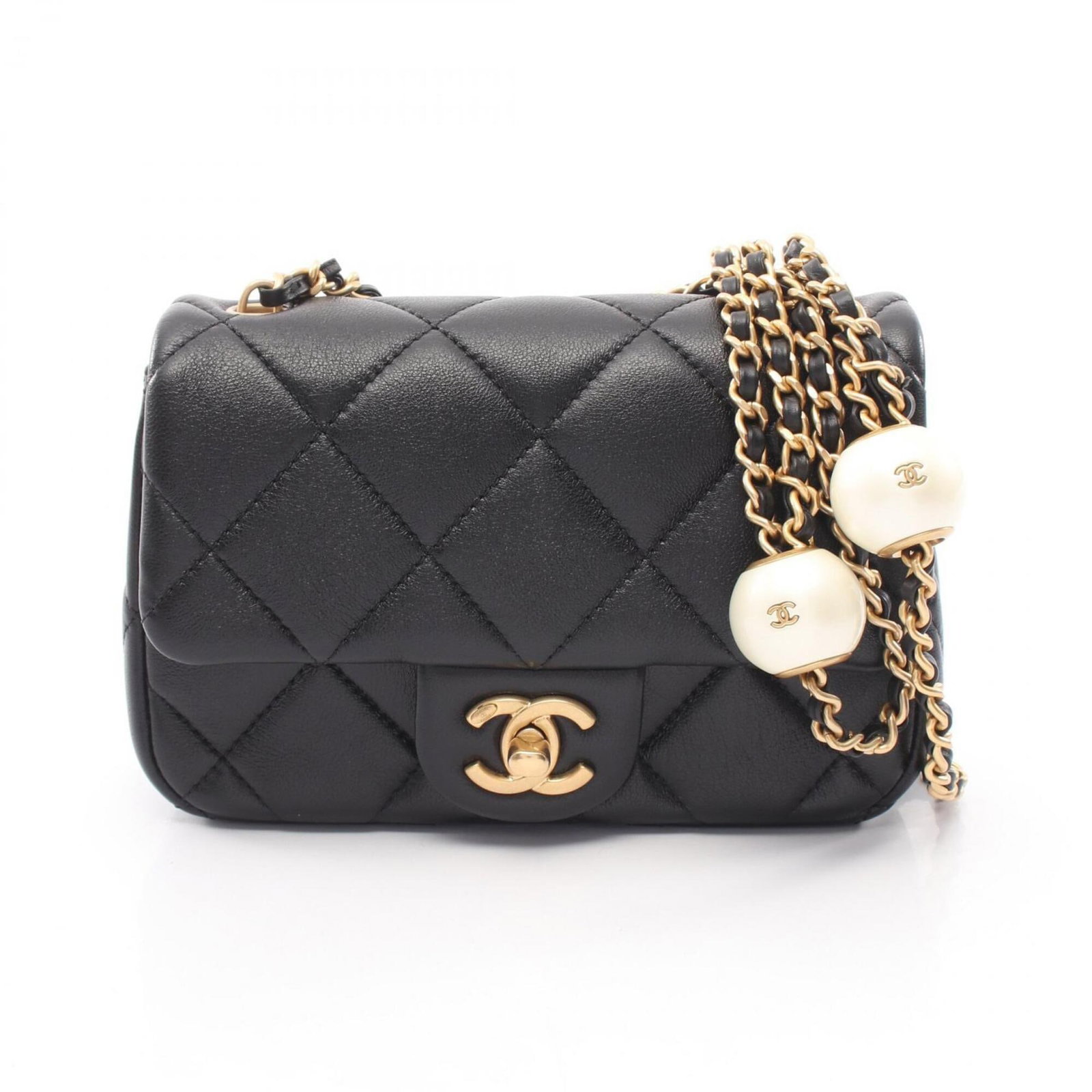Shoulder Bag Leather Handbag Chanel: Shoulder Bag Leather Handbag Chanel This luxurious Chanel shoulder bag is crafted from high-quality lambskin leather, featuring a sleek black finish and gold hardware accents. Measuring 12cm x 17cm x