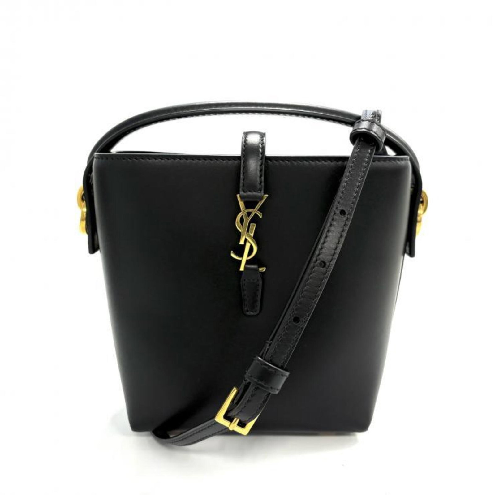 Suede Leather Saint Laurent Handbag: Suede Leather Saint Laurent Handbag Suede leather Saint Laurent handbag in black, featuring a lambskin material and dimensions of 15cm x 17cm x 9cm. This luxurious handbag boasts a sleek design and