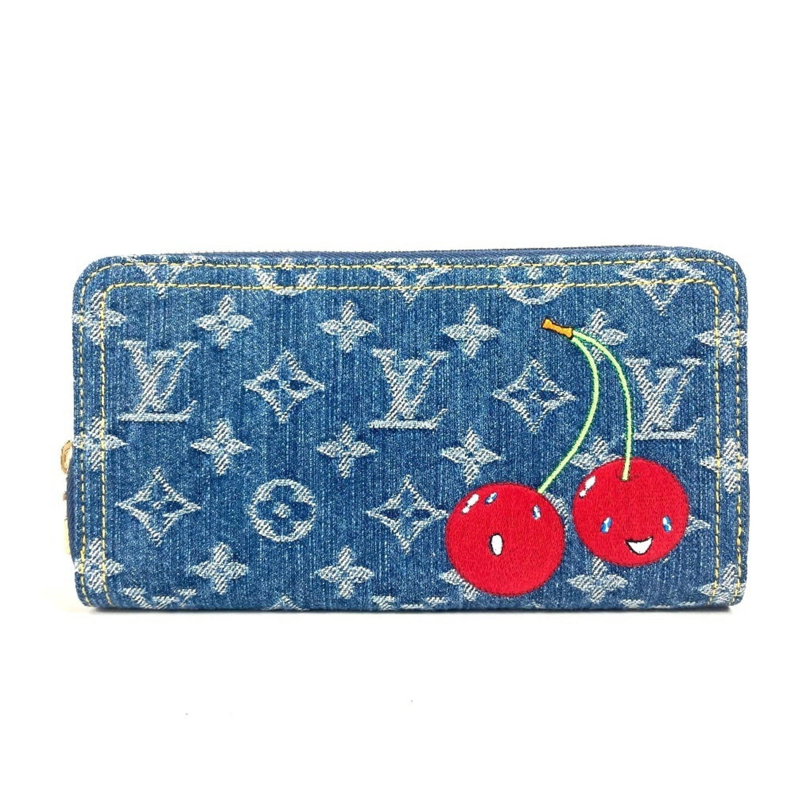 Long Wallet Louis Vuitton Bi Fold: Long Wallet Louis Vuitton Bi Fold The Louis Vuitton Monogram Denim Long Wallet is a stylish bi-fold design, featuring the iconic Monogram pattern in a vibrant blue hue. Measuring 10.5cm x 19.5cm, this