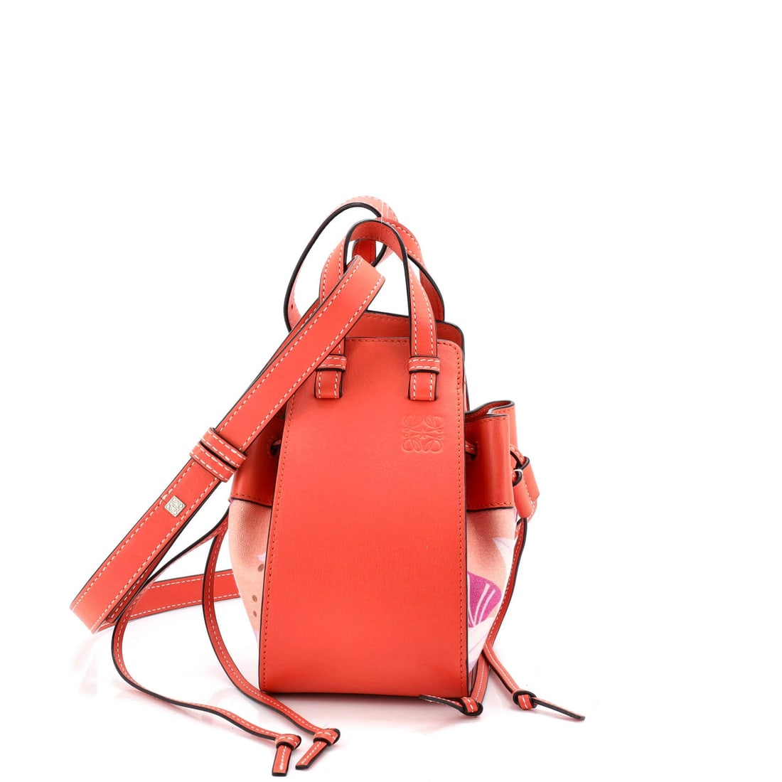 Loewe Hammock Bag Leather and Printed Canvas Mini: Loewe Hammock Bag Leather and Printed Canvas Mini The Loewe Hammock Bag Leather and Printed Canvas Mini is a stylish cross body bag with a unique blend of canvas and leather materials. Its exterior