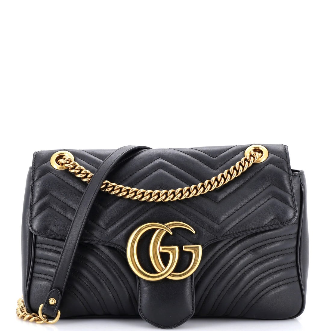 Marmont Matelasse Medium Leather Bag Flap Gucci GG: Marmont Matelasse Medium Leather Bag Flap Gucci GG Black Marmont Matelasse Medium Leather GG Flap Bag from Gucci, featuring a classic shoulder design with a gold-tone hardware. The bag's exterior