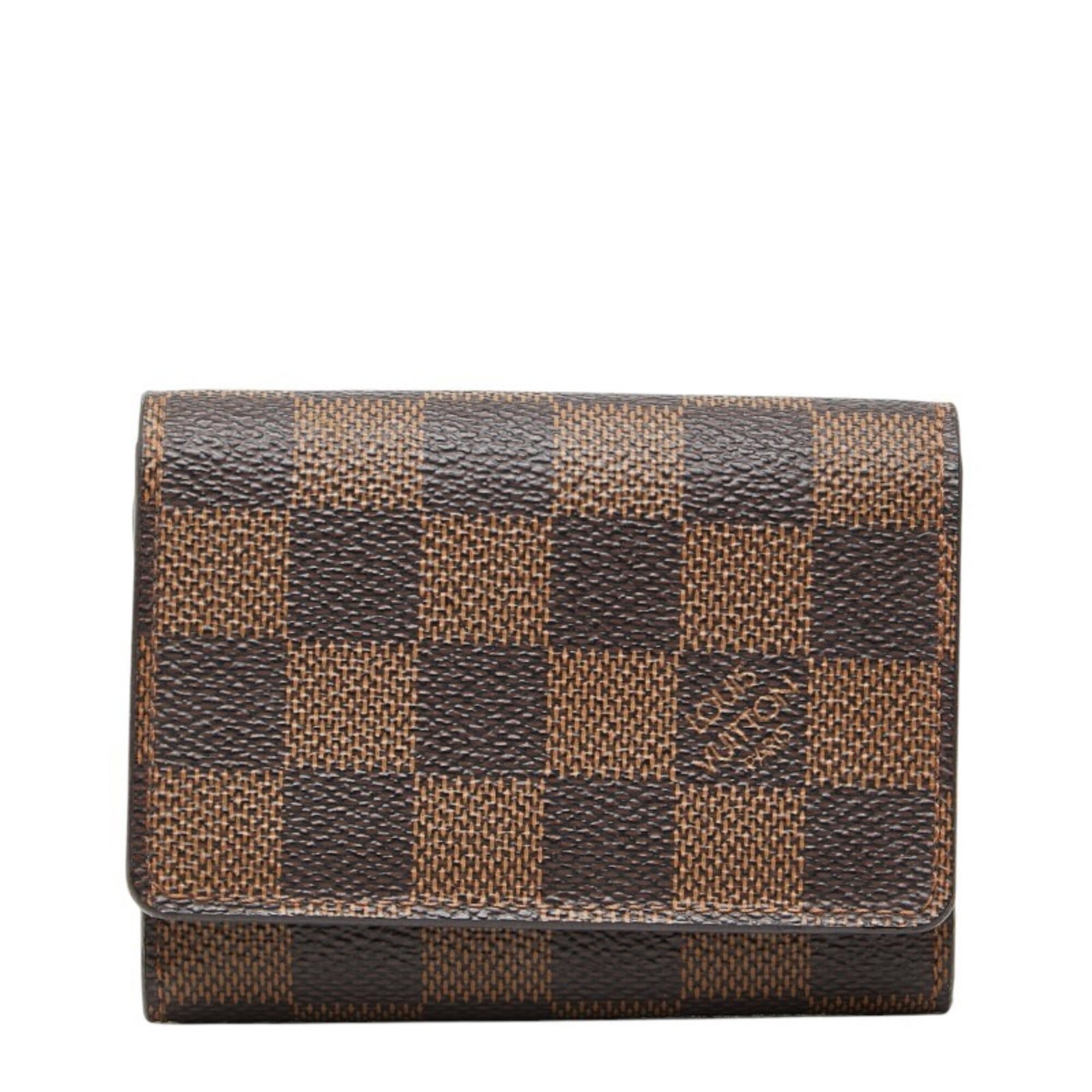 Case Louis Vuitton Card: Case Louis Vuitton Card The Louis Vuitton Card is a compact, brown card case with a size of 7.5cm x 10cm x 1cm, featuring a classic design that is both elegant and understated. This case is made of
