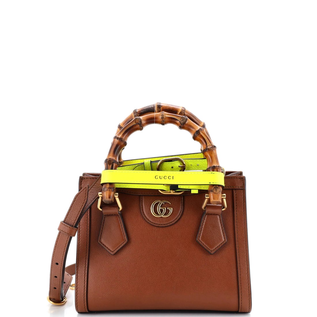 Gucci Leather Mini Bamboo Handle Tote Diana NM: Gucci Leather Mini Bamboo Handle Tote Diana NM Gucci's iconic Leather Mini Bamboo Handle Tote, featuring a stylish cross-body design, is a chic accessory for everyday use. This compact tote boasts a r