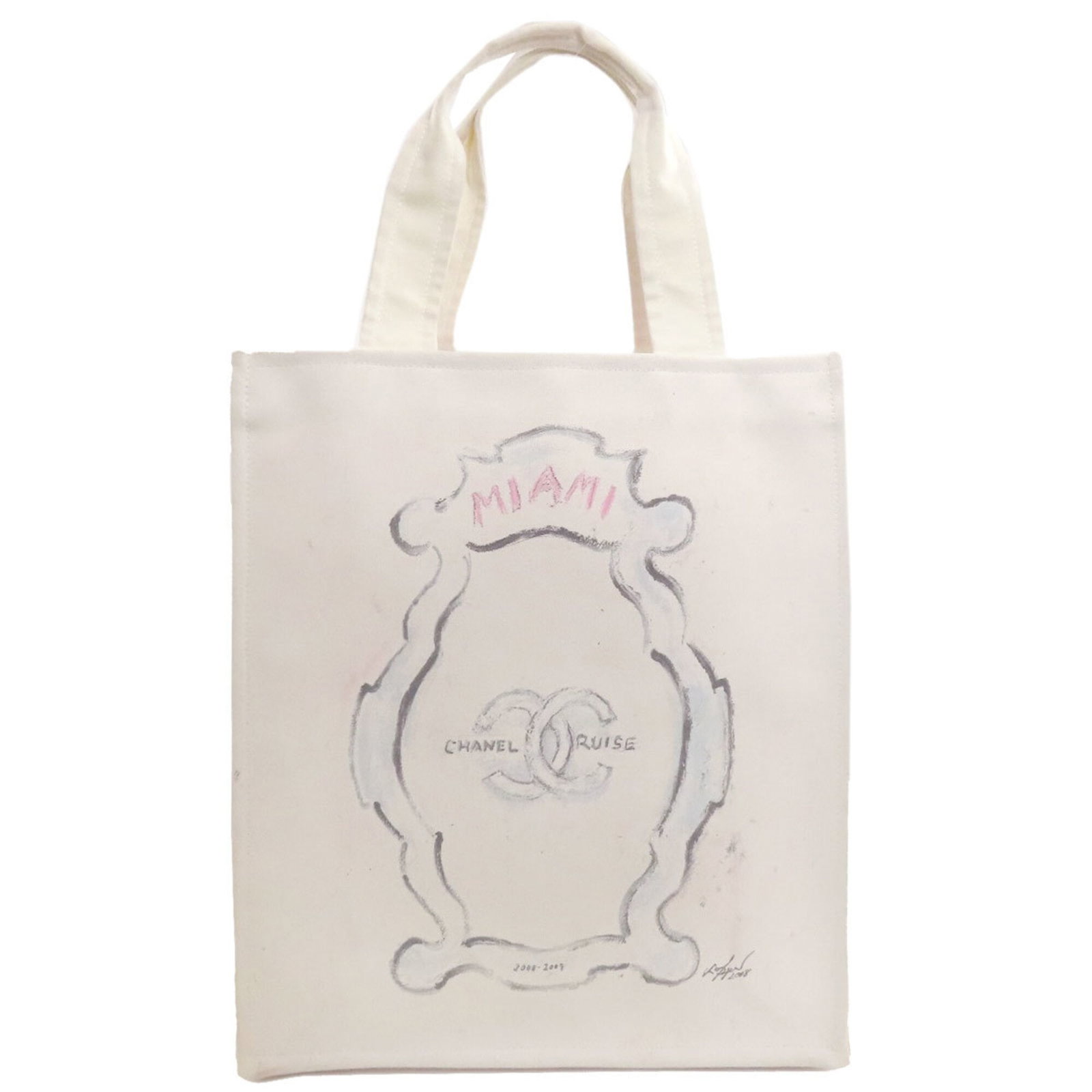 Canvas tote bag by Chanel: Canvas tote bag by Chanel Canvas tote bag by Chanel, a crisp white canvas tote with clean lines and classic design, measures 39cm x 34cm x 12.5cm and features a 47cm long handle. The bag's simple yet
