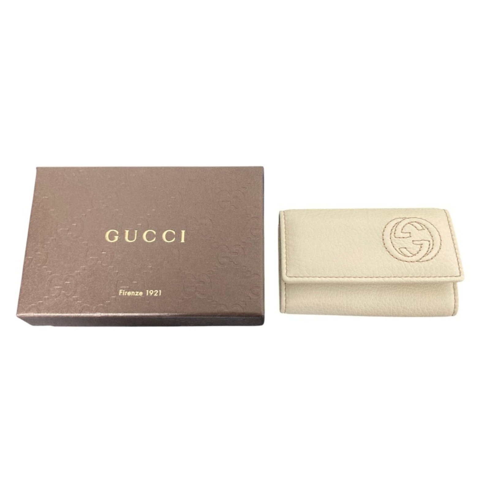 Keycase Leather Gucci: Keycase Leather Gucci Keycase Leather Gucci is made from high-quality leather and features 6 key hooks, providing ample storage for small essentials. The off-white color and sleek design make it a sty
