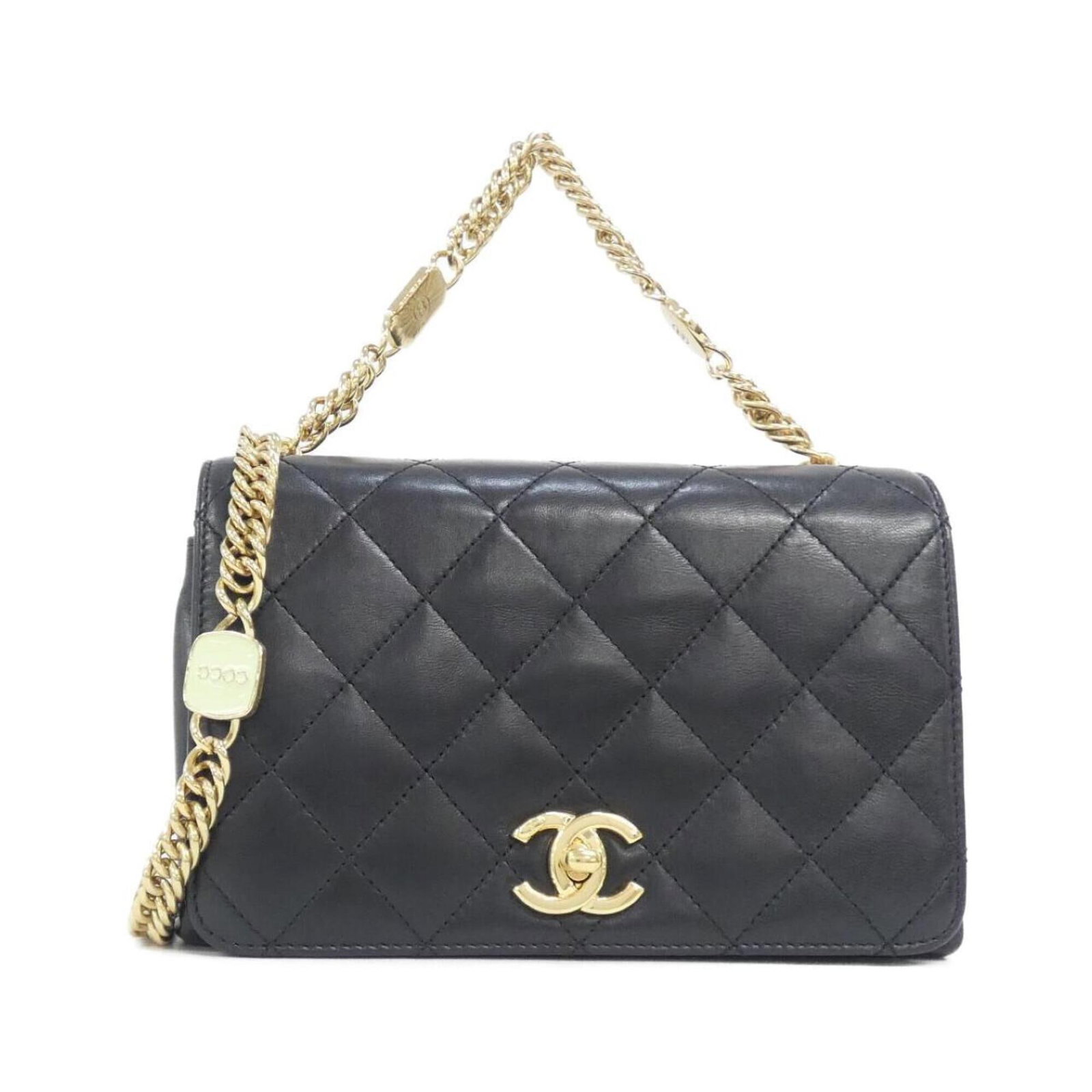Handbag Leather from Chanel: Handbag Leather from Chanel This luxurious black handbag is crafted from genuine lamb leather, a premium material known for its softness and durability. The gold hardware adds a touch of elegance, whi