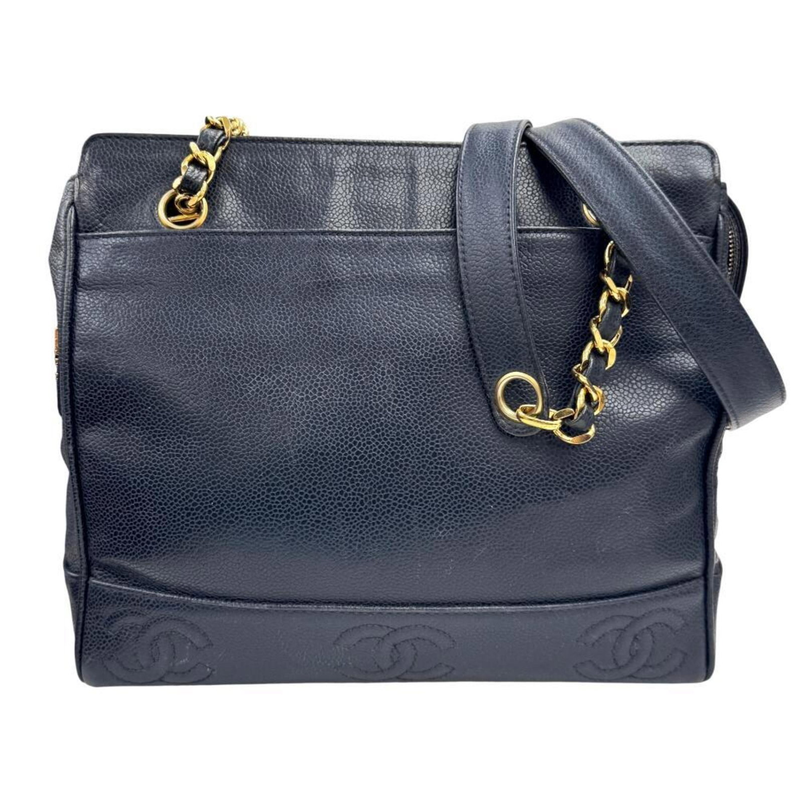 Calfskin Tote Bag Chanel: Calfskin Tote Bag Chanel Calfskin Tote Bag Chanel - Navy. Made from high-quality Grained Calfskin, this navy tote bag features a classic design with a timeless 24cm x 27.5cm x 10cm size. The bag's