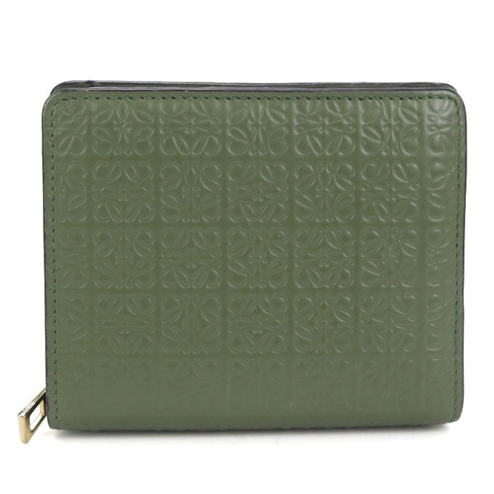 Loewe Wallet (Bi-Fold) Leather: Loewe Wallet (Bi-Fold) Leather The Loewe bi-fold wallet is crafted from high-quality calfskin leather, featuring a striking green color. Made in Spain, this stylish wallet boasts a classic design