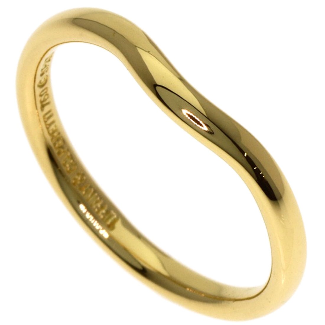 Tiffany&Co Curved Gold K18 Yellow Ring Band: Tiffany&Co Curved Gold K18 Yellow Ring Band K18 Yellow Gold Curved Ring Band from Tiffany&Co. Features a sleek, curved design made from 18K Yellow Gold, with a ring size of 5.25(US). This stylish band