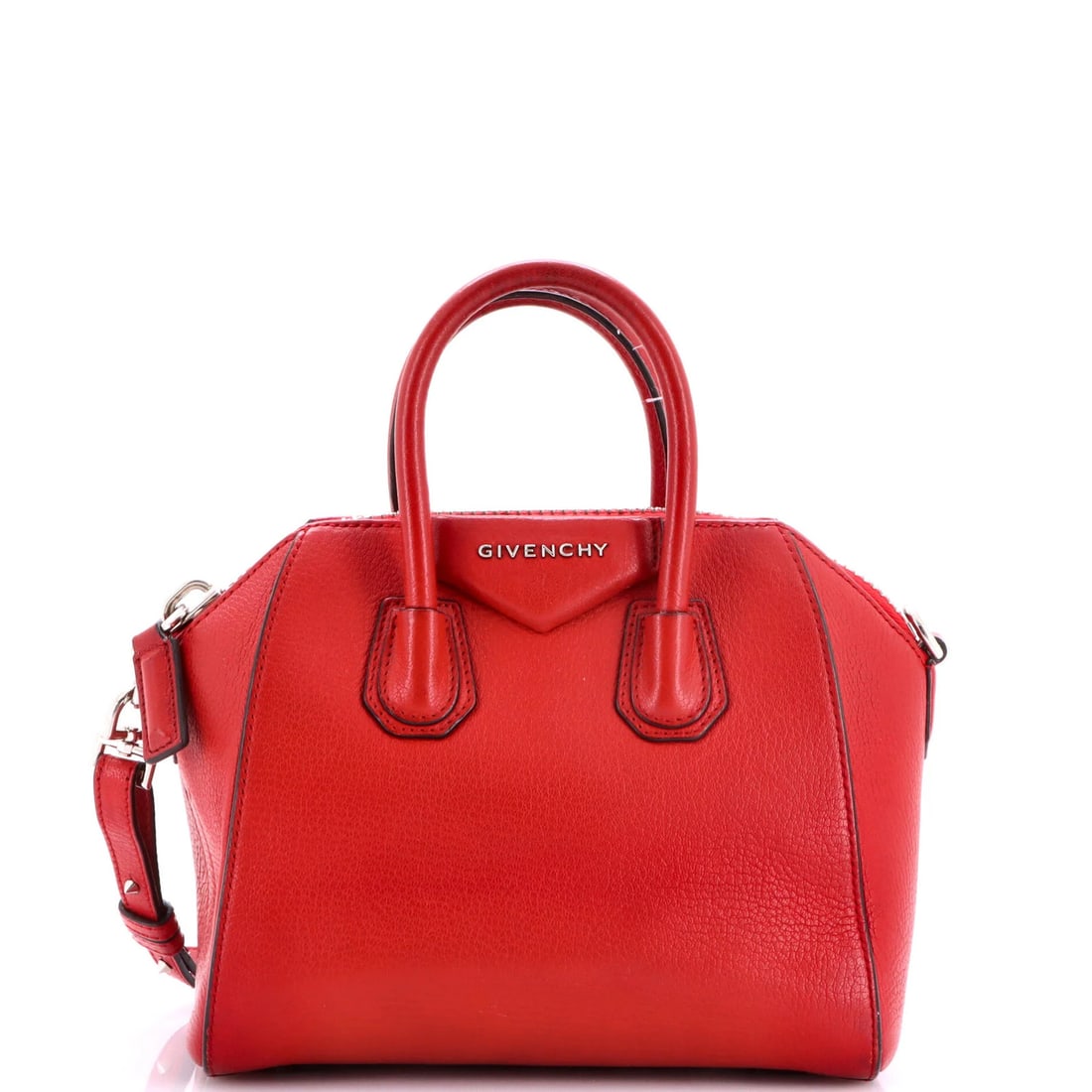 Leather Mini Bag Antigona Givenchy: Leather Mini Bag Antigona Givenchy The Givenchy Antigona Leather Mini Bag boasts a striking red exterior and neutral interior, perfectly balanced by silver hardware. Measuring 7.5" tall and 9" wide,