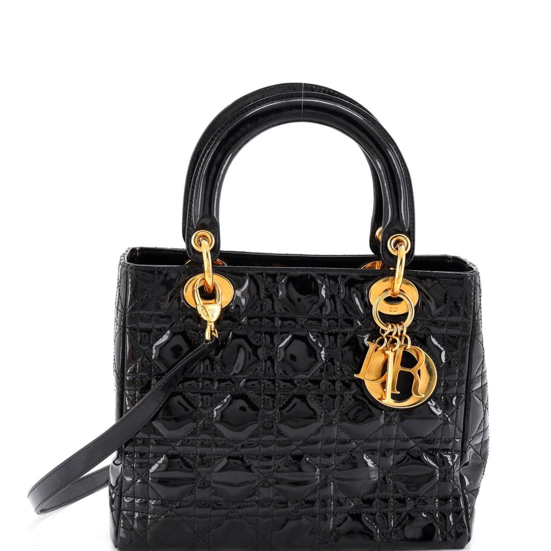 Lady Dior Bag Cannage Medium Patent Quilt Christian: Lady Dior Bag Cannage Medium Patent Quilt Christian The Lady Dior Bag Cannage Medium Patent Quilt in black patent leather features a unique quilted design and gold hardware, adding a touch of