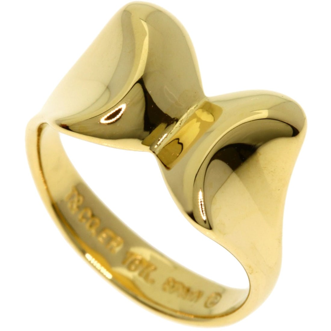 Tiffany & Co Ribbon Motif K18 Gold Ring: Tiffany & Co Ribbon Motif K18 Gold Ring K18 gold provides a luxurious and durable metal for this Tiffany & Co. Ribbon Motif ring, showcasing a beautiful gold hue. The ring features a ribbon motif