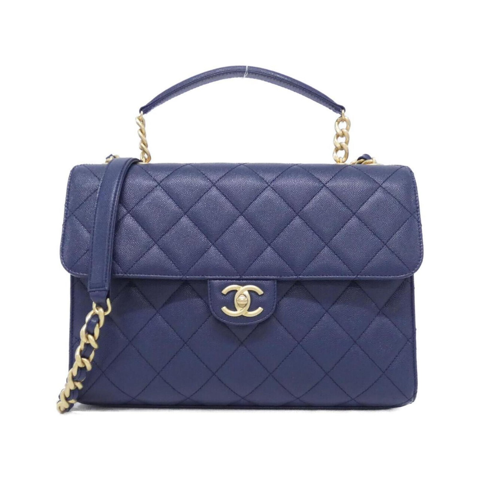 Calfskin Handbag Chanel: Calfskin Handbag Chanel Grained Calfskin Navy Chanel Handbag. This navy handbag features a classic design with a 21.5cm x 30cm x 7cm size, made from high-quality grained calfskin material. The