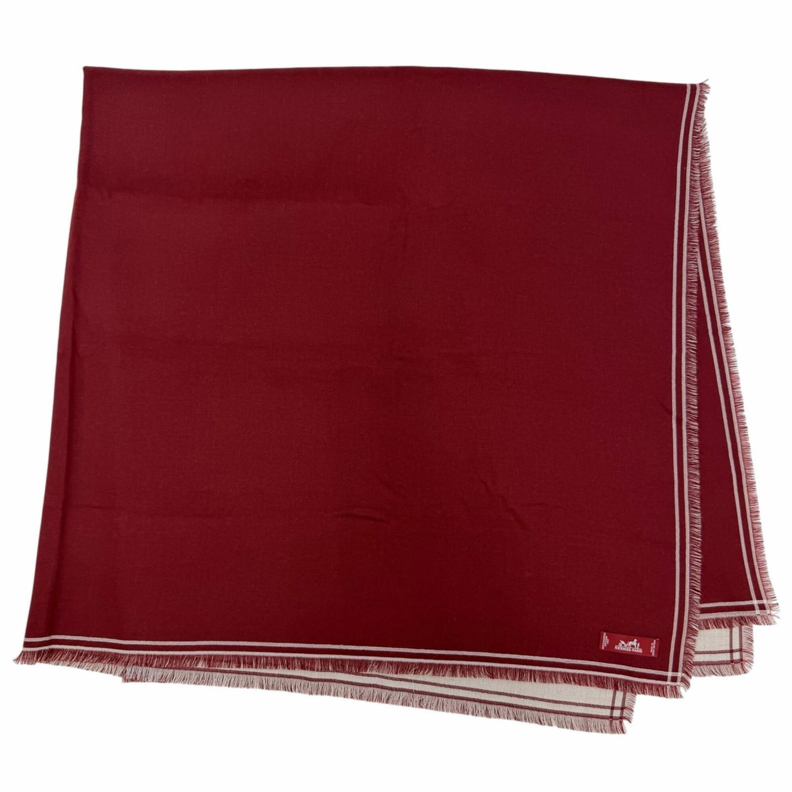 Cashmere Shawl Hermes: Cashmere Shawl Hermes The Hermes Cashmere Shawl is a stunning piece of craftsmanship, boasting a rich Bordeaux color and soft, luxurious off-white trim. Made from the finest cashmere material, this