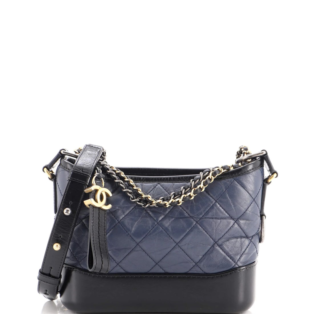 Calfskin Quilted Aged Small Hobo By Gabrielle Chanel: Calfskin Quilted Aged Small Hobo By Gabrielle Chanel Navy blue quilted Aged Calfskin Small Hobo by Gabrielle Chanel, featuring minor scuffs and creases on the exterior, with a classic gold, silver,