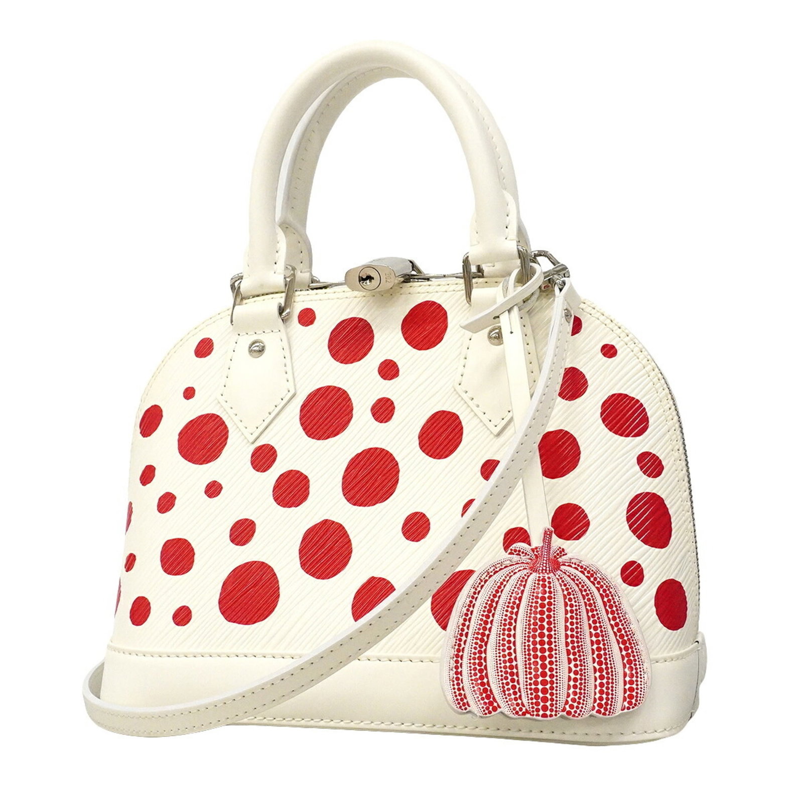 Handbag Louis Vuitton: Handbag Louis Vuitton Blanc and Rouge hues accentuate the sleek design of this Louis Vuitton handbag, measuring 18cm x 23cm x 11cm. The classic style and timeless color combination make it a