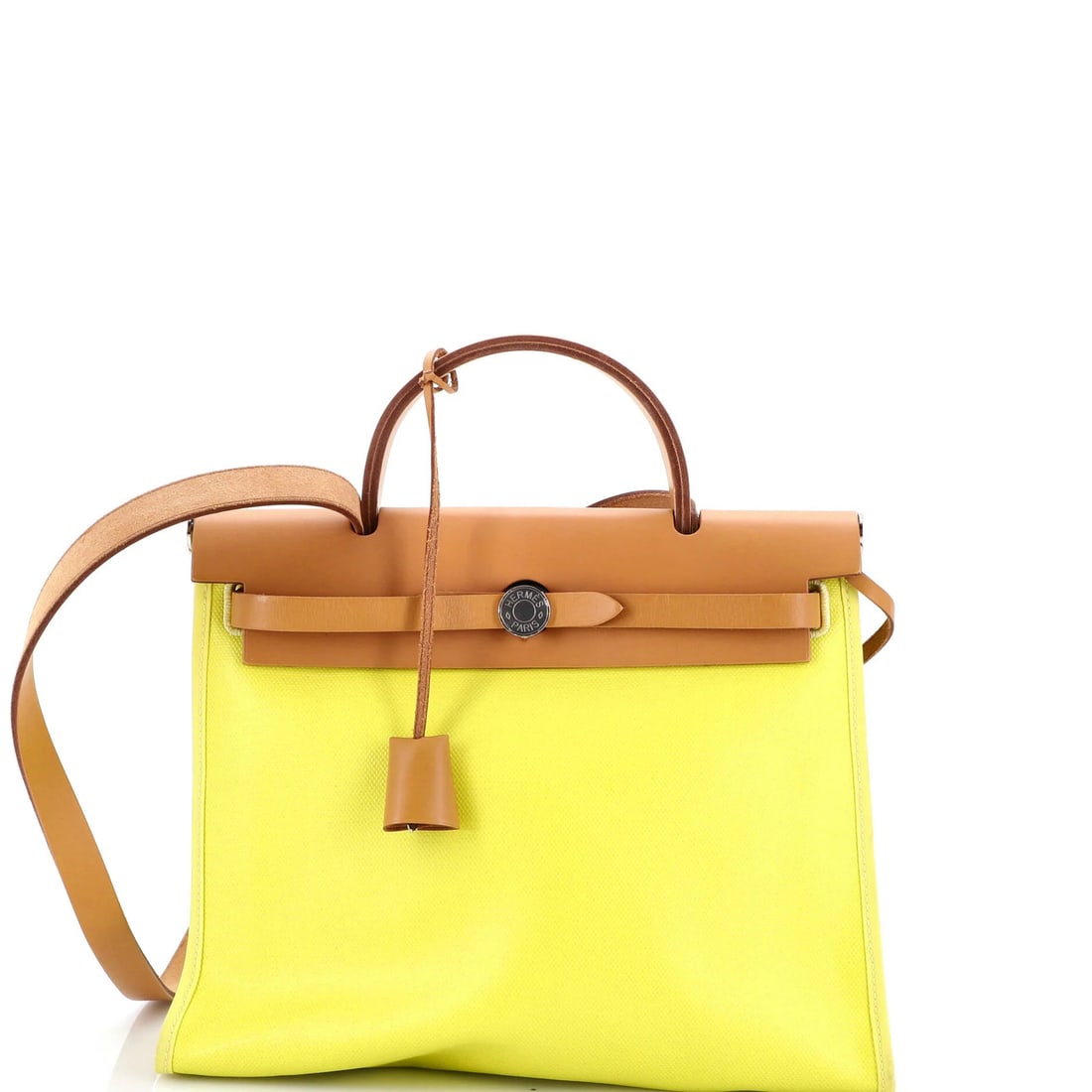 Hermes Herbag Zip Berline Vache Canvas and Leather 31: Hermes Herbag Zip Berline Vache Canvas and Leather 31 Yellow canvas and leather exterior, a vibrant and eye-catching combination, defines the Hermes Herbag Zip Berline Vache Canvas and Leather 31.