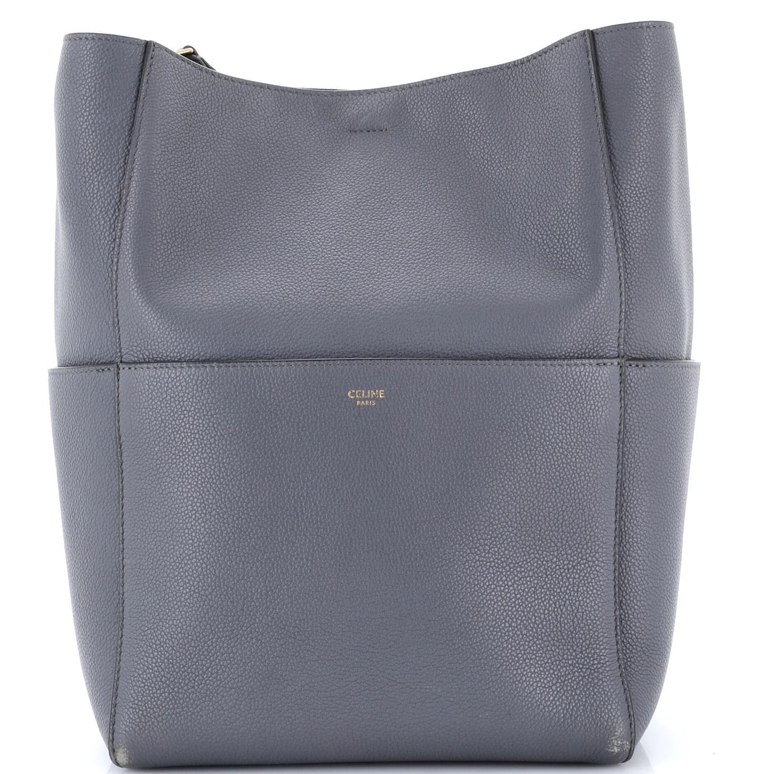 Calfskin Large Celine Sangle Seau Bag: Calfskin Large Celine Sangle Seau Bag Calfskin Large Celine Sangle Seau Bag is a large shoulder bag made from high-quality leather, featuring a gray exterior and suede interior. The bag's aged gold ha