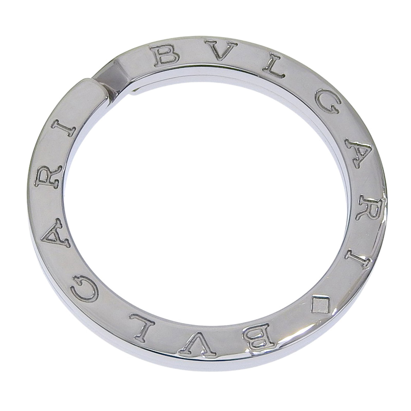 Silver 925 Bvlgari Keyring: Silver 925 Bvlgari Keyring Silver 925 Bvlgari Keyring is a sleek and modern accessory made from high-quality silver 925 material. Its compact size and weight make it a convenient and stylish addition