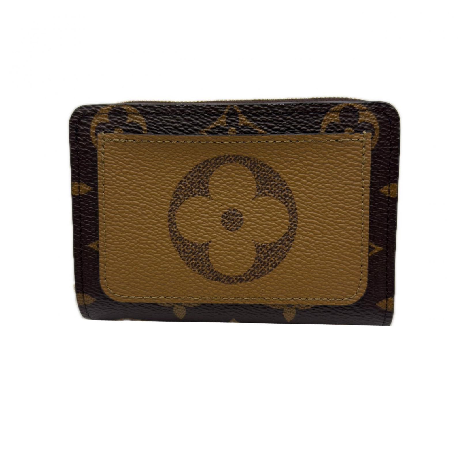 Canvas Leather Coated Wallet Coated Bi Fold Louis Vuitton: Canvas Leather Coated Wallet Coated Bi Fold Louis Vuitton Coated canvas and leather blend in this bi-fold wallet, featuring the iconic Monogram Reverse pattern. The beige and brown hues add a touch of