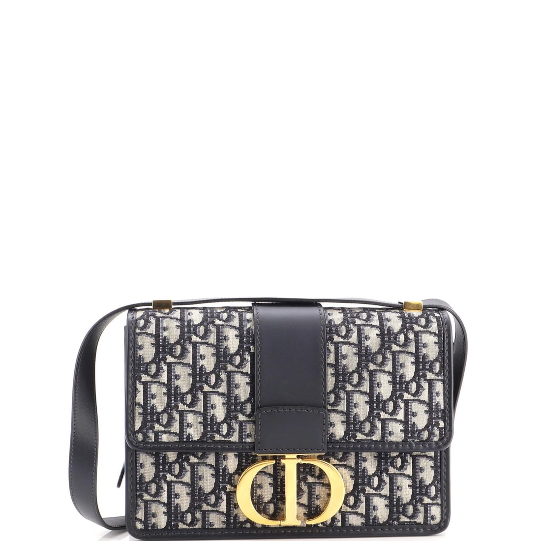 Dior Oblique Canvas Christian Montaigne Bag Flap 30: Dior Oblique Canvas Christian Montaigne Bag Flap 30 The Dior Oblique Canvas Christian Montaigne Bag Flap 30 is a stunning blue canvas cross body bag with a classic flap design. Measuring 6.5" tall and