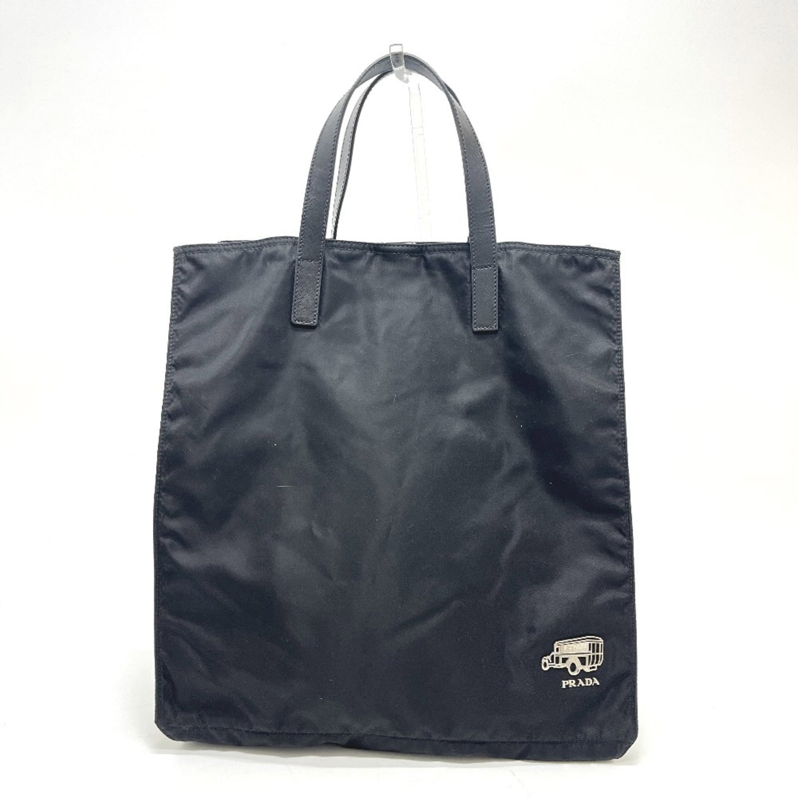 Tote Bag Nylon Prada: Tote Bag Nylon Prada Black Nylon Prada Tote Bag, 37cm x 35cm x 18cm, made from high-quality nylon material, features a sleek and modern design. The bag's compact size and durable construction make it