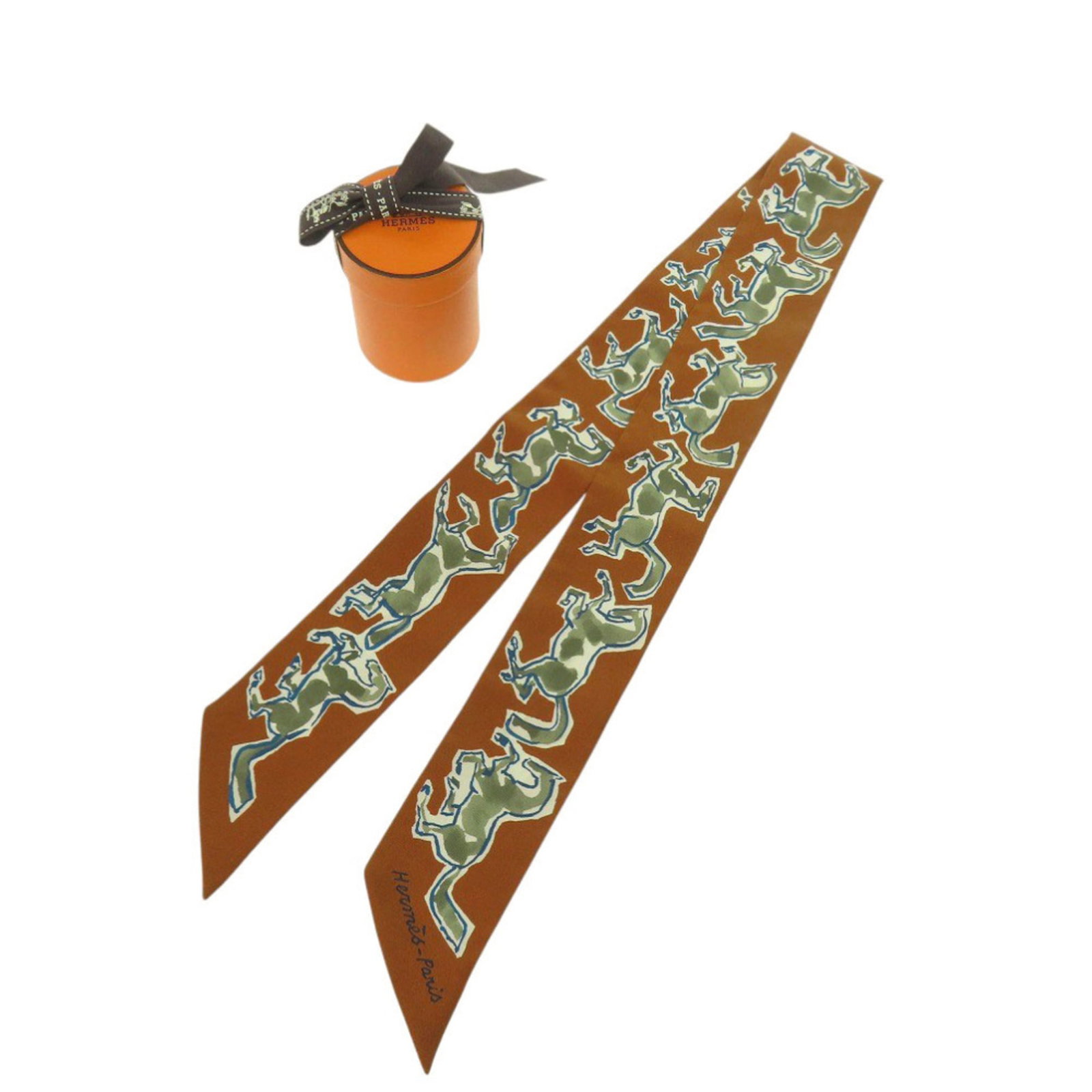Silk Hermes Scarf: Silk Hermes Scarf Silk from France, this scarf measures 86cm x 33.85'' and is made from high-quality silk material. The scarf features a classic brown, khaki, and white color combination, making it a 