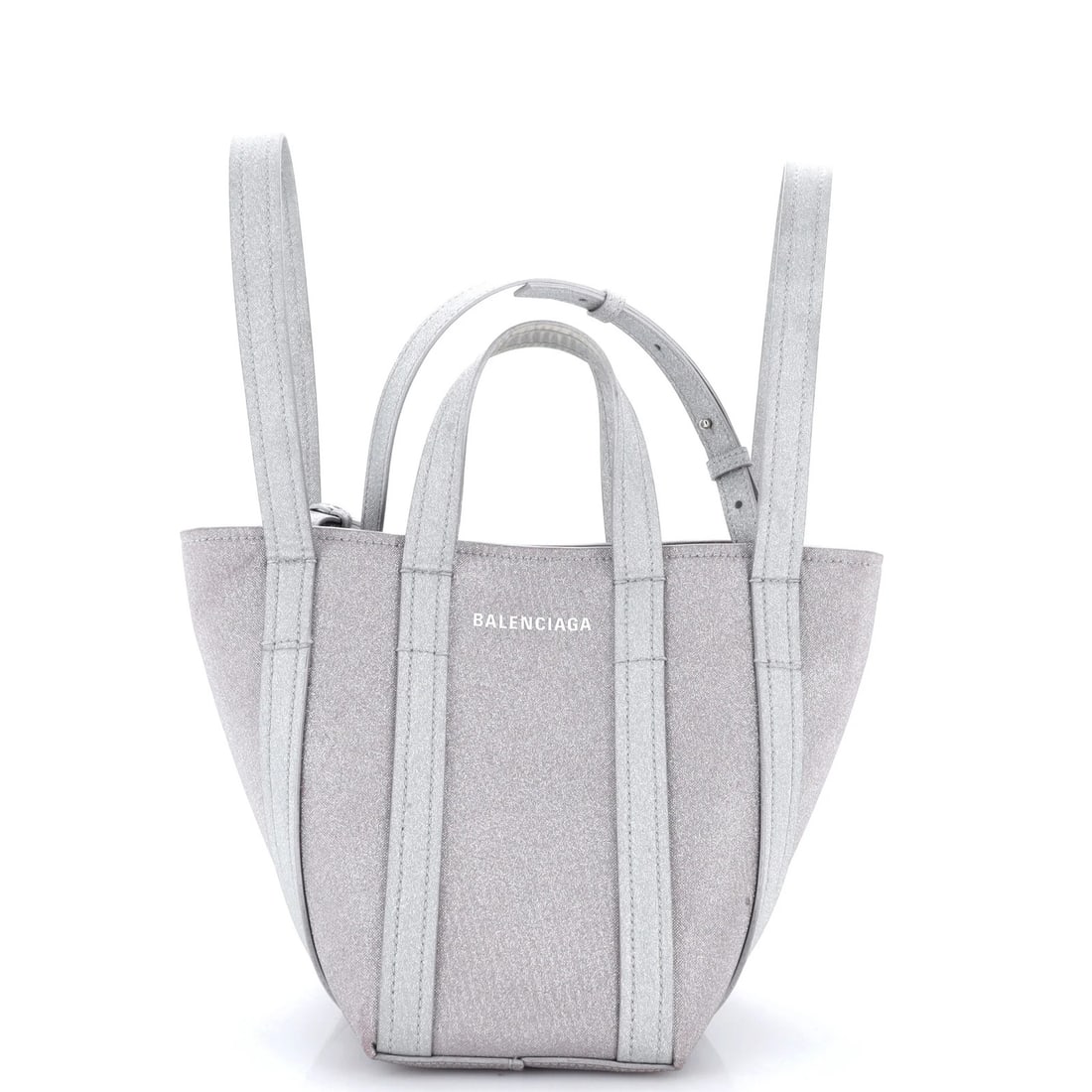 Glitter Fabric Tote Balenciaga North South XS Everyday: Glitter Fabric Tote Balenciaga North South XS Everyday Glittering metallic canvas fabric adds a touch of luxury to this Balenciaga North South XS Everyday tote. With a sturdy top handle and