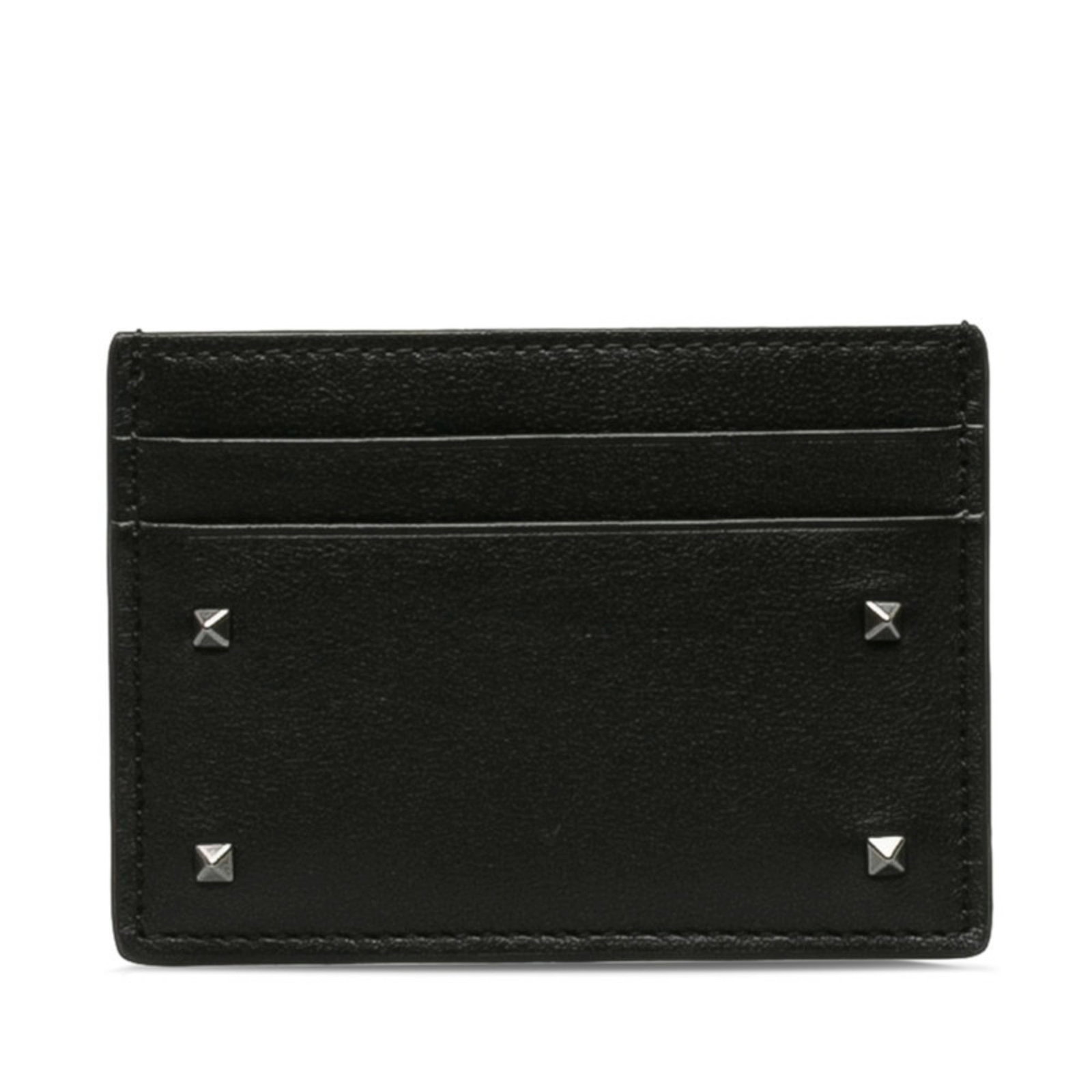 Valentino Card Case Leather: Valentino Card Case Leather Black leather card case from Valentino, measuring 7cm x 10cm x 5mm, comes with a box and dust bag. This elegant card case showcases the brand's signature style and