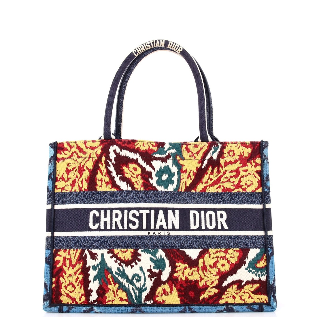 Canvas Embroidered Book Medium Christian Dior Tote: Canvas Embroidered Book Medium Christian Dior Tote Canvas Embroidered Book Medium Christian Dior Tote boasts a unique multicolor design on its canvas exterior, adding a touch of visual interest to