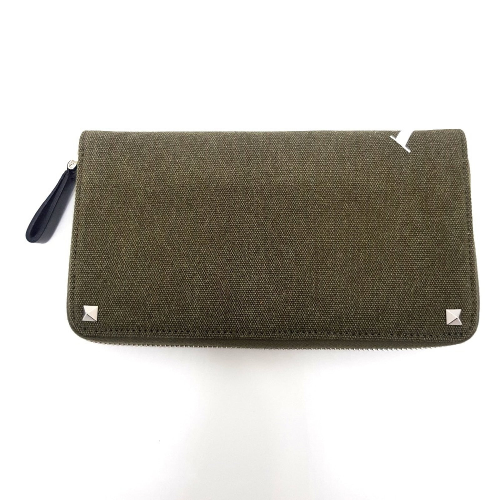 Long Wallet Canvas Leather Bi Fold Valentino Garavani: Long Wallet Canvas Leather Bi Fold Valentino Garavani Canvas and leather come together in this bi-fold wallet from Valentino Garavani, featuring a unique khaki and white color combination. Measuring
