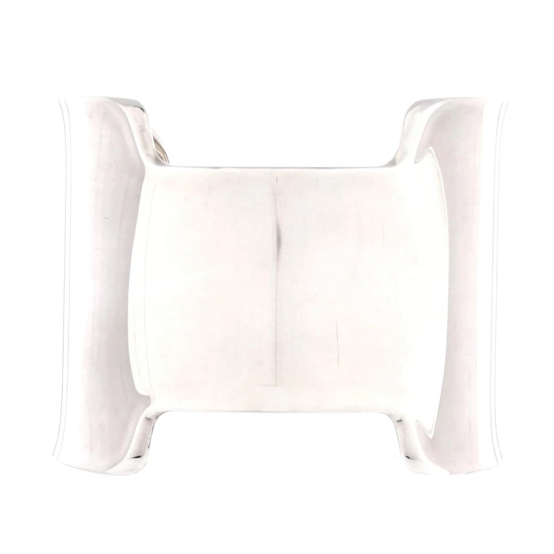 Hermes Amazone Cuff Large Sterling Silver: Hermes Amazone Cuff Large Sterling Silver The Hermes Amazone Cuff Large Sterling Silver is a striking piece, boasting a silver exterior with a unique design. Measuring 7" in circumference and 2" in wi