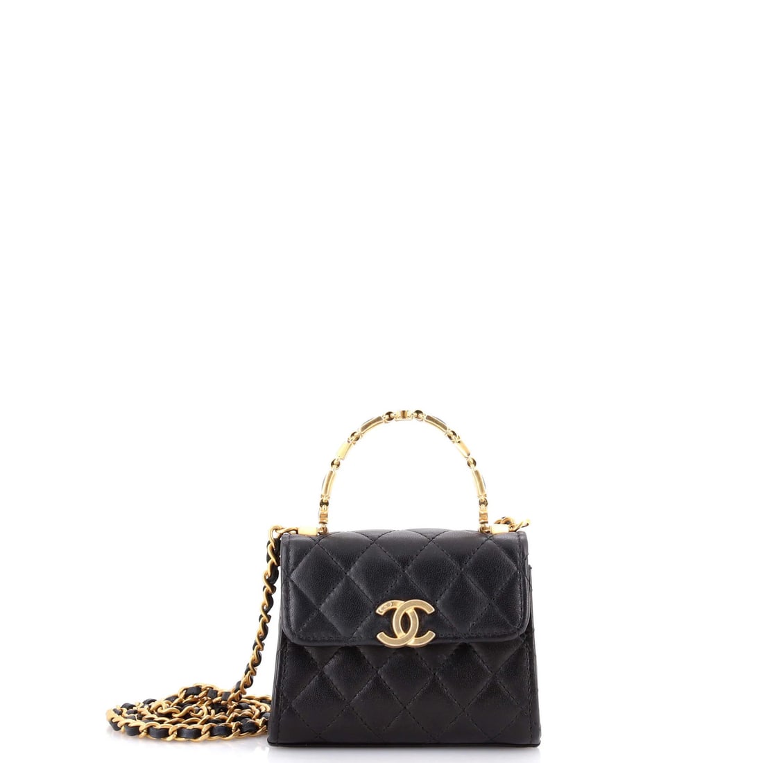 Coco Chanel Quilted Lambskin Small Flap Handle Top Bag Enamel: Coco Chanel Quilted Lambskin Small Flap Handle Top Bag Enamel Small, quilted lambskin top bag with a classic flap handle and aged gold top handle, bearing the signature of the renowned fashion house C