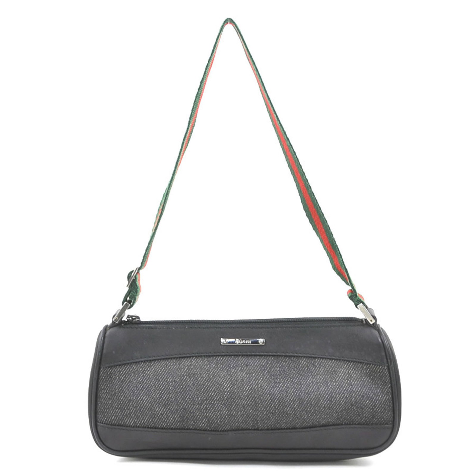 Handbag Canvas Leather Gucci: Handbag Canvas Leather Gucci This Gucci handbag is made from a combination of leather and canvas, with a sleek black finish. It measures 9cm x 20cm x 5.5cm and is a compact, stylish accessory. The