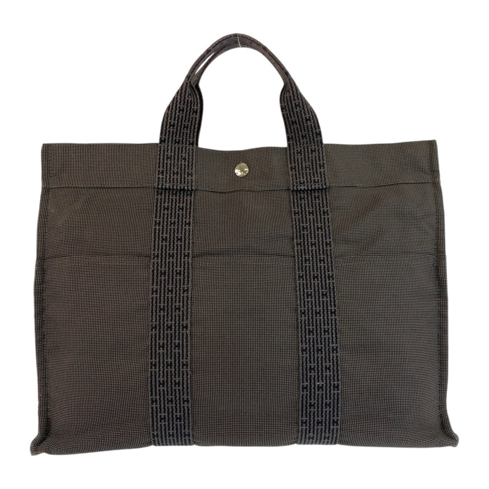 Handbag Hermes Tote Polyester Polyamide: Handbag Hermes Tote Polyester Polyamide The Hermes Tote is a stylish and versatile handbag made from high-quality Polyester and Polyamide materials, featuring a sleek gray color. Measuring 31cm x 42cm