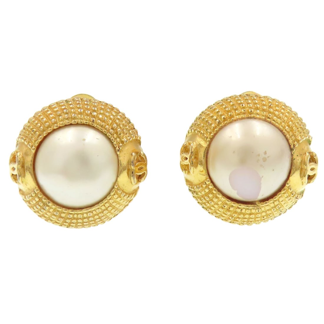 Coco Mark Earring Metal Faux Chanel Pearl: Coco Mark Earring Metal Faux Chanel Pearl Gold Coco Mark Earring Metal Faux Chanel Pearl. This gold earring features a Coco Mark design, made from metal, with a faux Chanel pearl exterior. The gold