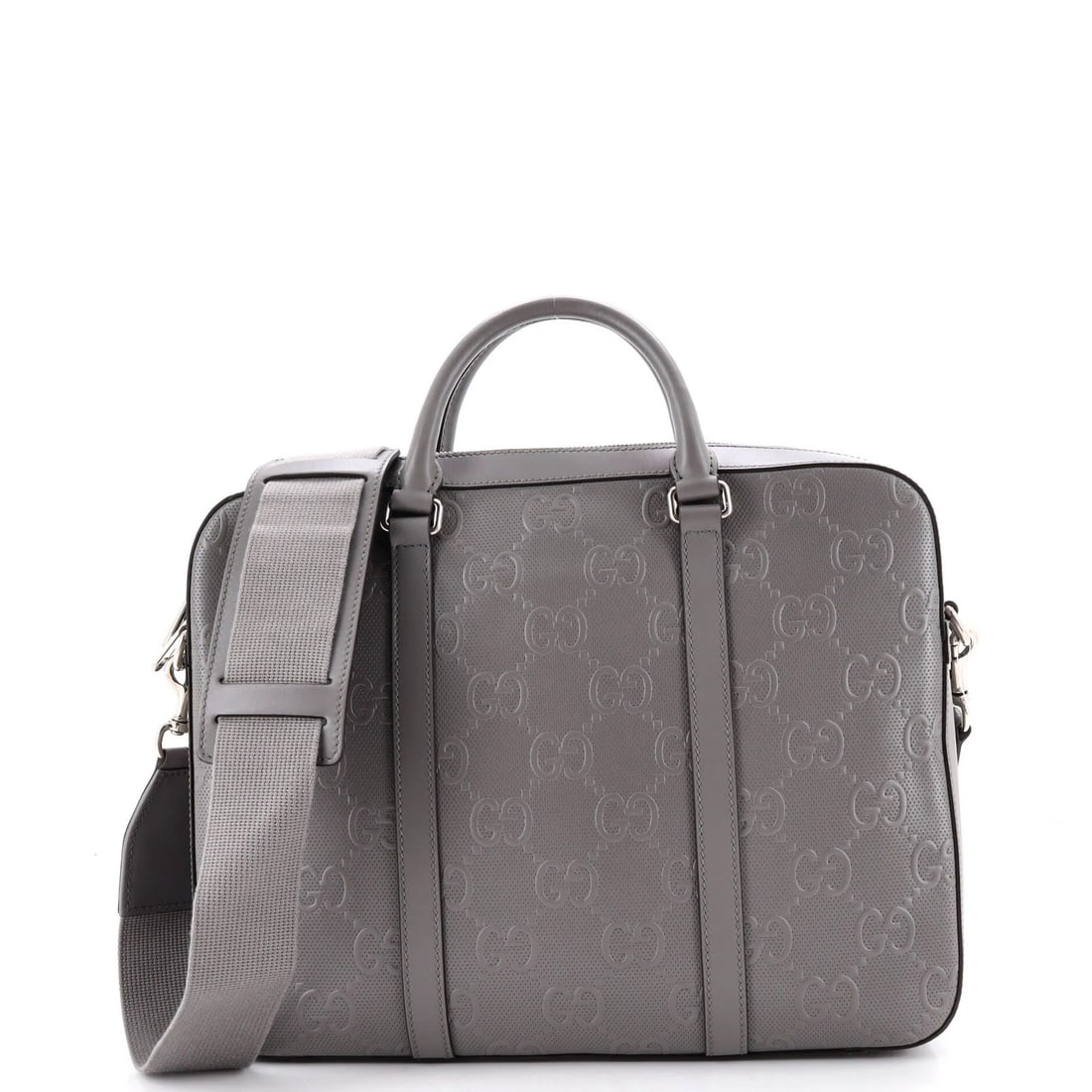 Gucci Embossed Leather Briefcase Medium Perforated: Gucci Embossed Leather Briefcase Medium Perforated Gucci Embossed Leather Briefcase Medium Perforated - A versatile and stylish medium-sized briefcase with a perforated leather exterior in a sleek