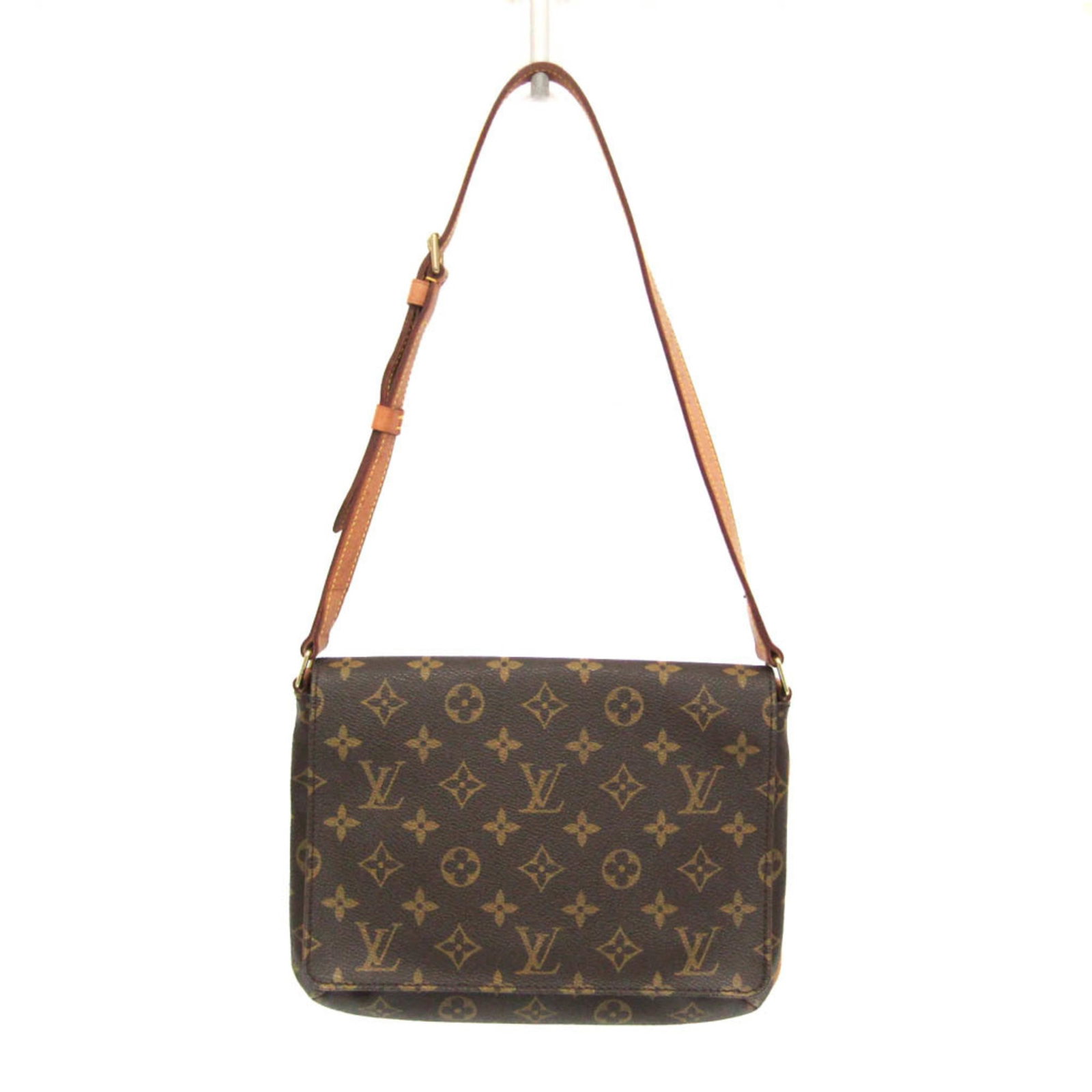 Shoulder Bag Monogram Louis Vuitton: Shoulder Bag Monogram Louis Vuitton Monogram Louis Vuitton Shoulder Bag. This iconic Musette Tango Short Strap bag features the classic Monogram pattern and a sturdy design. With an open pocket and