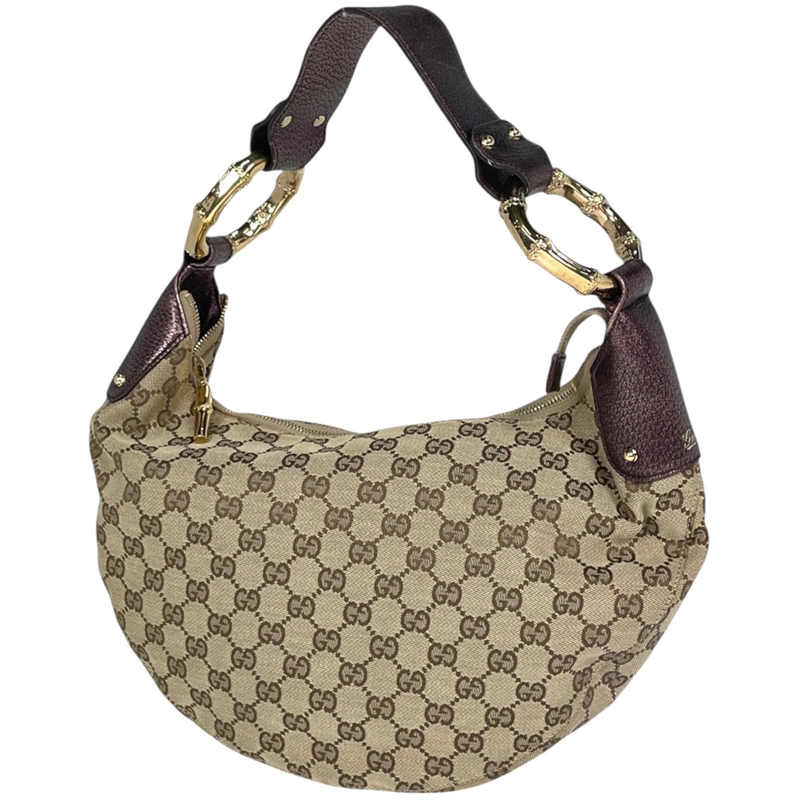 Gucci Bamboo Bag: Gucci Bamboo Bag The Gucci Bamboo Bag boasts a unique bamboo material, a distinctive feature of this stylish shoulder bag. Measuring 22cm x 38cm x 7cm, it offers a spacious interior and a sleek